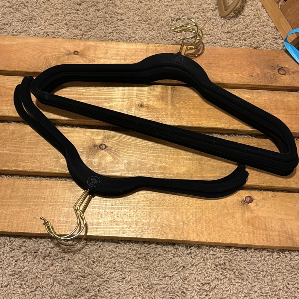 Joy Mangano black flecked hangers.
